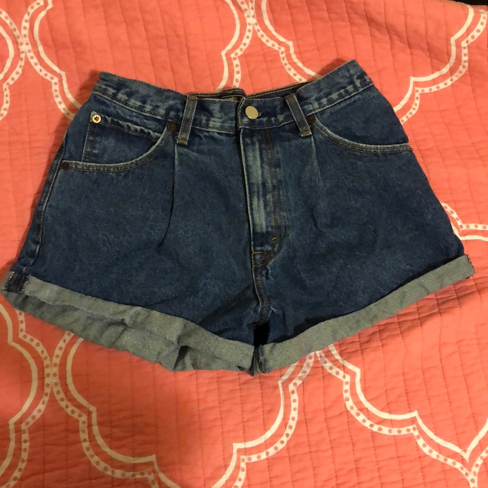 High waisted pleated shorts.